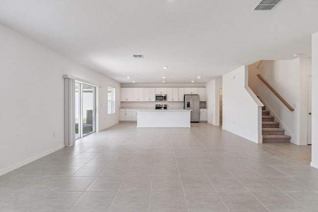 Photo - Spacious 5 Bedroom with 3 Baths + Bonus & 2,673 Sq Ft of Comfort in Edgewater, FL!