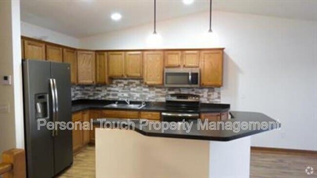 Building Photo - 2420 5th St W Unit C Rental