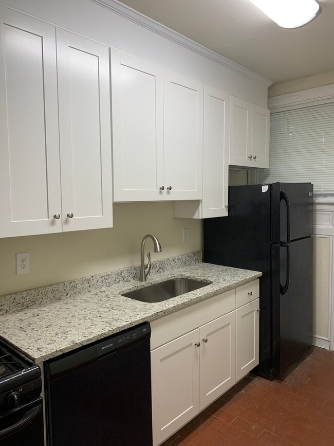 Photo - Renovated 3 Bedroom Townhouse! Off Street parking and Washer/Dryer!!
