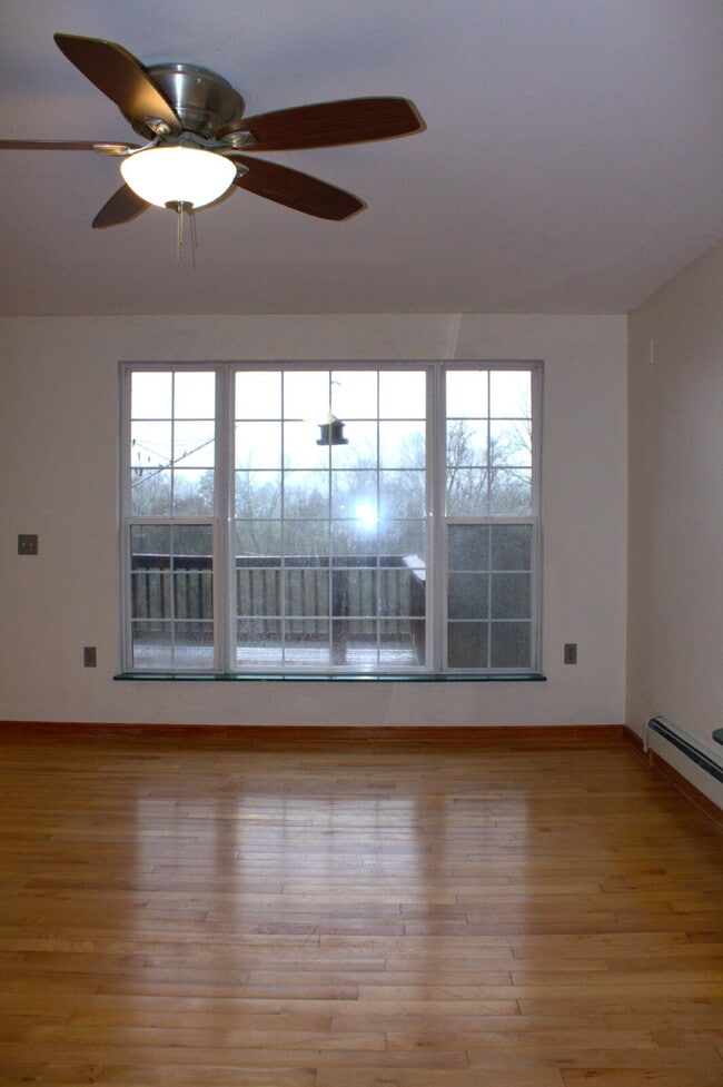 Photo - "Charming 2-Bed Retreat with Hardwood Elegance in Scenic Marshall, NC"