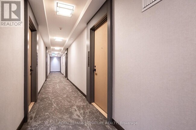 Photo - 225 Village Green Square Unité PH05