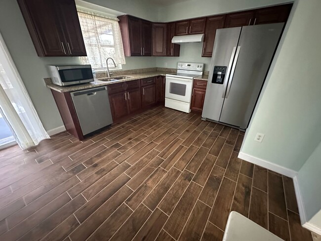 Photo - Unique Find! HUGE detached garage/workshop, 3 bedroom, 1 1/2 bath home, screened porch