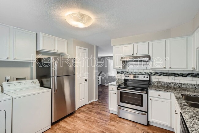 Building Photo - 2445 Lawrence St Unit B