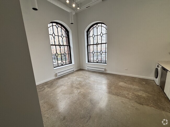 Building Photo - 1009 W Lawrence Ave Unit C Rental