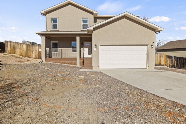 Building Photo - Spacious Home with Finished Basement, Granite Kitchen & Fenced Yard Near Fort Carson