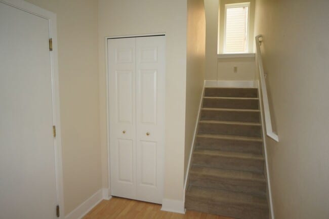 Photo - Beautiful 2 bedroom Belmont Condo. 3 Stories, 1 car garage, open floor plan, a/c. Amazing unit!