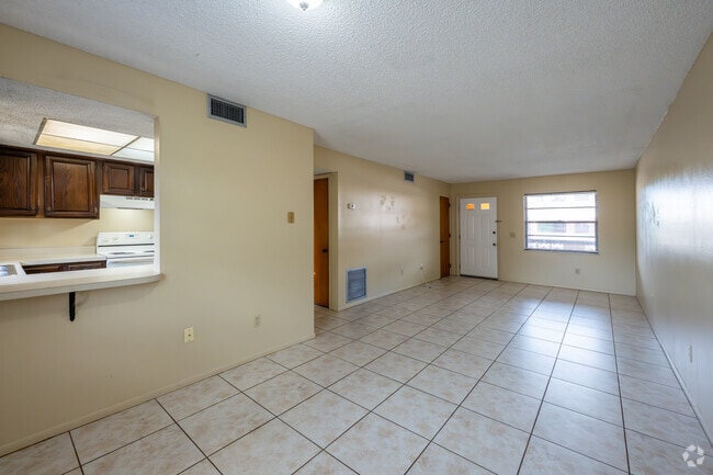 1BR, 1BA - 680SF - Version B - Living Room and Dining Room