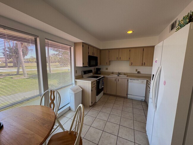 Photo - FULLY FURNISHED 2-Story Townhouse on Canal – Pool, Golf Views & ALL Utilities Included!