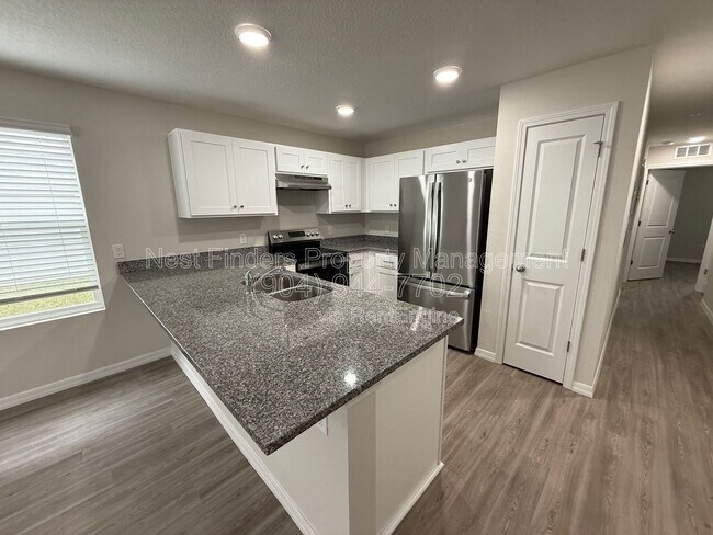 Building Photo - 11478 Oakfield Ct Unit 102