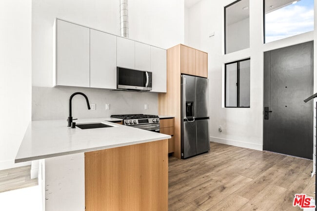 Building Photo - 11013 Hartsook St Unit 403