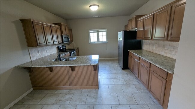 Photo - 4001 S W Capstone Ave