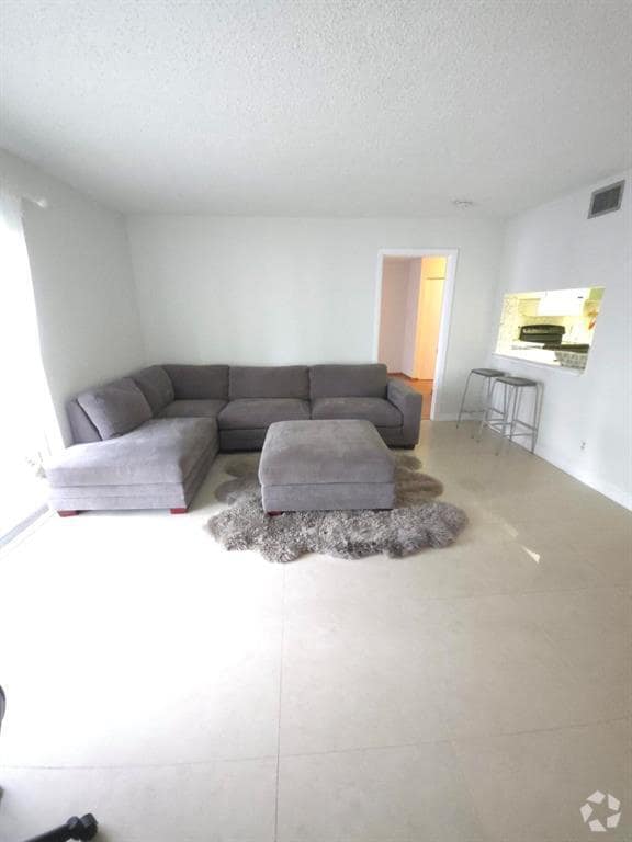 Building Photo - 3909 N Ocean Blvd Unit 115 Rental