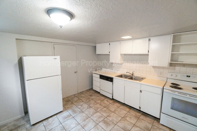 Building Photo - 1108 W 12th Ave Unit 4