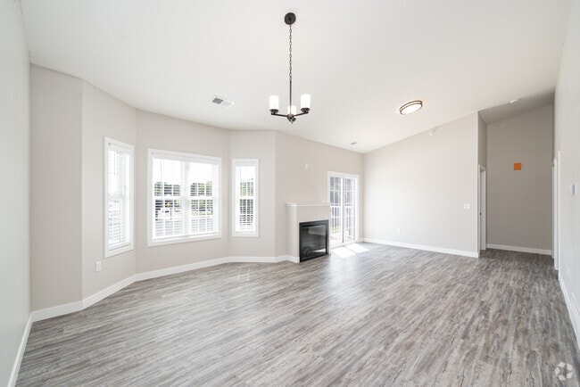2BR, 2BA - 1,240SF - Vaulted - Living Room - Empire Chateaus