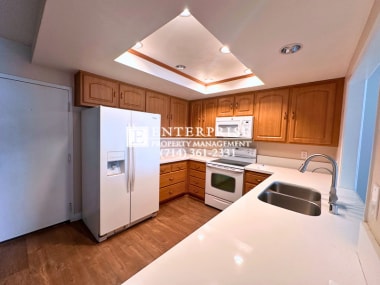 Photo - Tour this beautiful 3-bedroom Costa Mesa condo with a private balcony! Unit A102