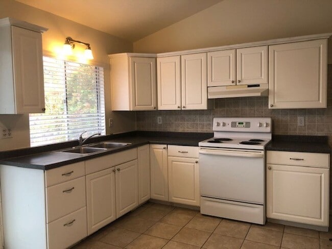 Photo - 4 bed-2 bath Single Story House with 2-Car...