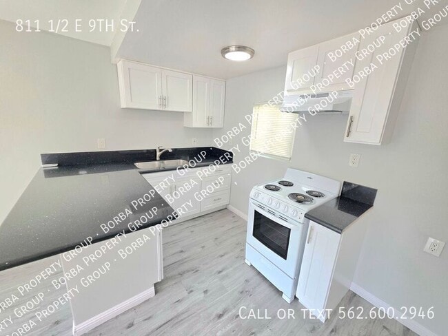 Building Photo - 811 1/2 E 9TH St.- Rental