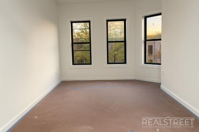 Photo - Stylish 1-Bedroom Apartment with Modern Amenities in Bed-Stuy
