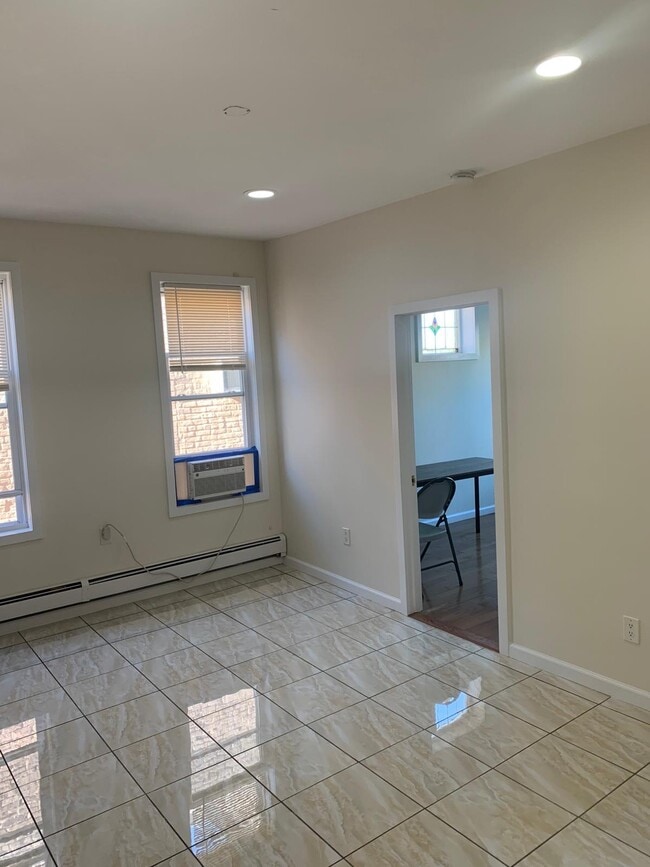 living room - 3132 82nd St Unit 2 FL