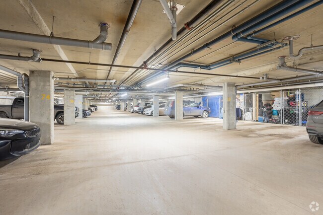 Covered Parking With Storage Units - La Vie Luxury Living