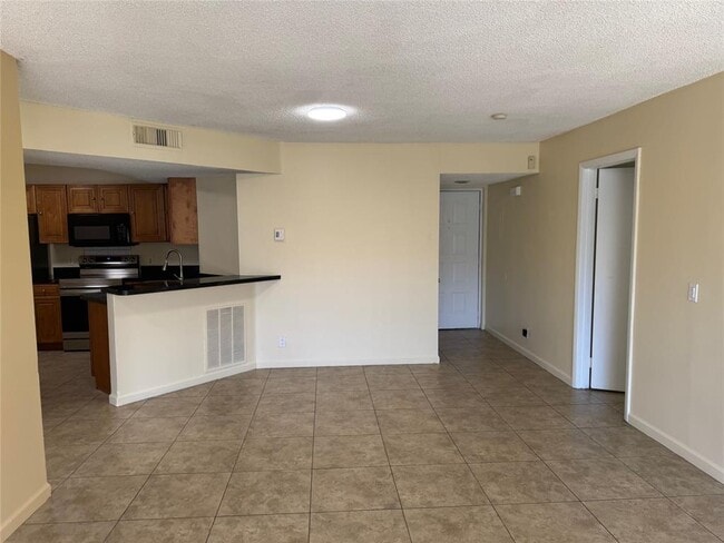 Photo - 9001 Wiles Rd Unidad 204