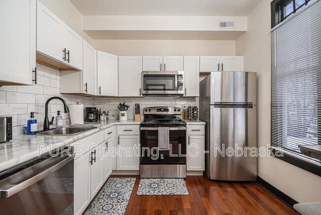 Photo - 2518 Woolworth Ave Unit 2