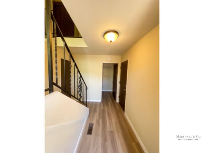 Photo - UPDATED AND BEAUTIFUL 2BR/1BA DUPLEX TOWNHOME, NEW WOOD FLOORING, PRIV. ENCLOSED BACK YARD, 2 CAR GA