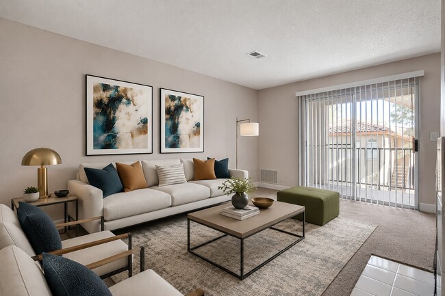 At Hidden Cove, modern elegance meets cozy living. This spacious lounge features stylish art, comfortable seating, and abundant natural light. Perfect for relaxation or entertaining. Explore your new home today!