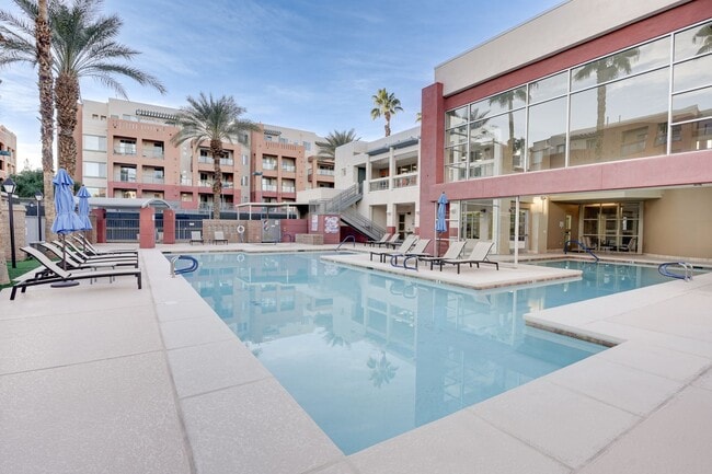 Photo - Luxury Guard-Gated 2-Bedroom Condo with Private Garage & Resort Amenities!