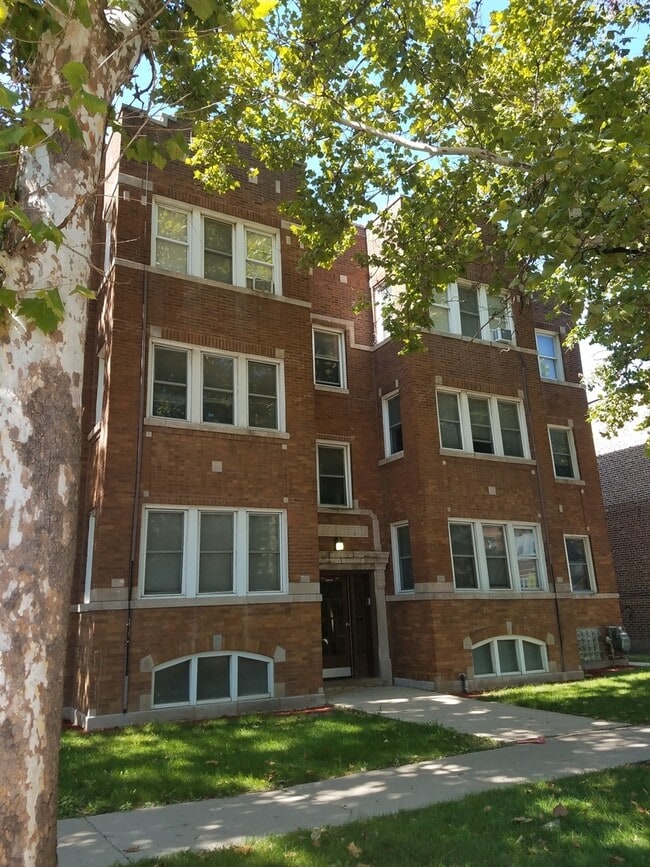 Building Photo - 5104 W 18th St Unit 1M Rental