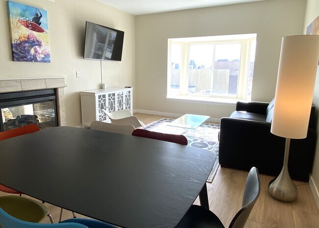 Living room with view over the city and bay - 2400 5th Ave Unit 432