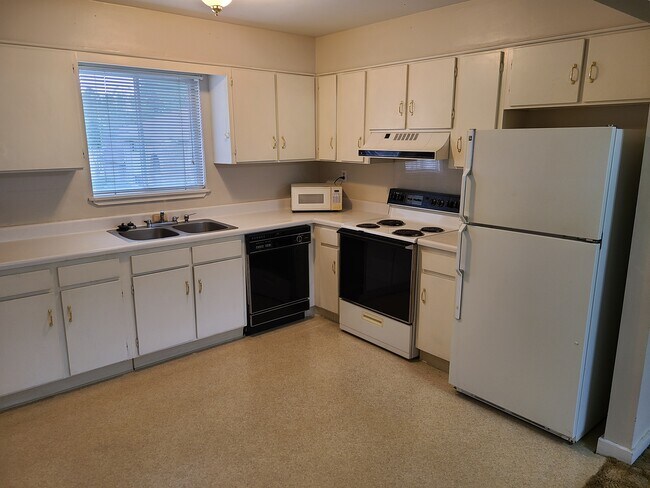 Kitchen with DW, disposer, microwave - 2243 Hillcrest Apartment Unit 6E