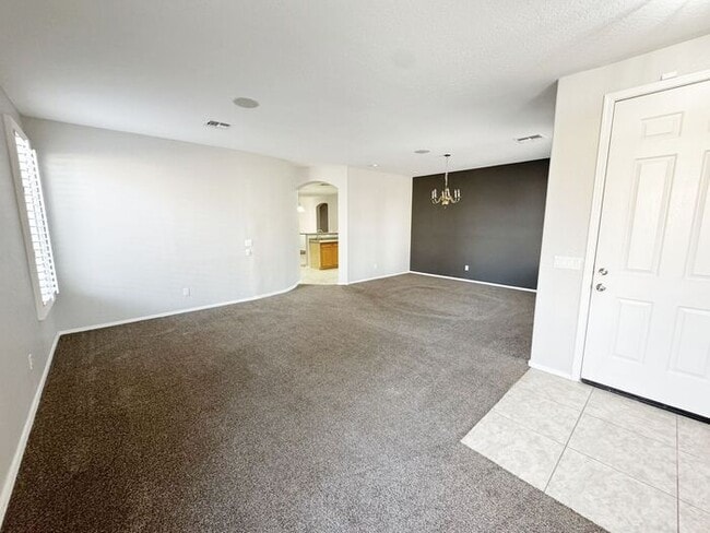 Photo - Single-level 4 bed, 2 bath home with tandem 3-car garage and RV gate.