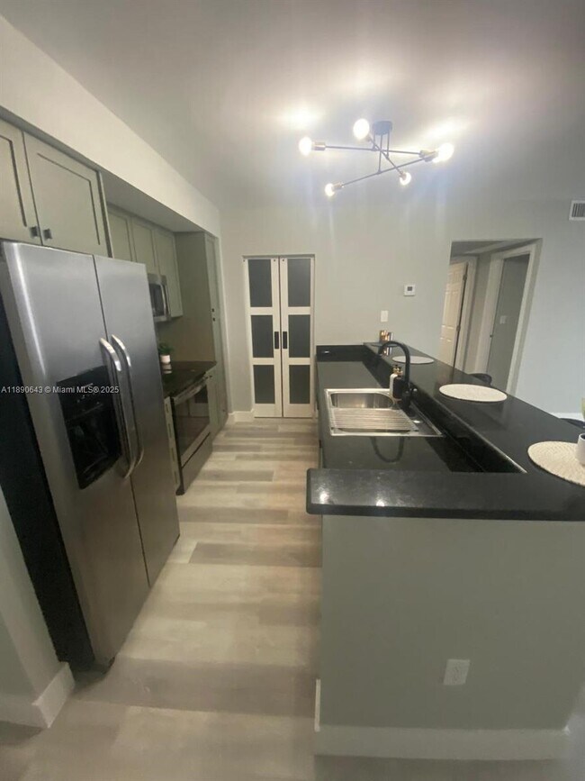 Photo - 10350 W Bay Harbor Dr Unit 7J