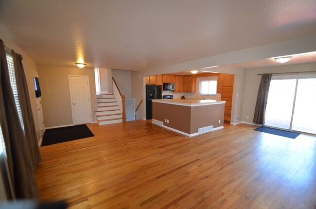 Photo - 4 bedroom home in Northglenn.  Newer paint with a large floor plan, wood floors & large deck for ...