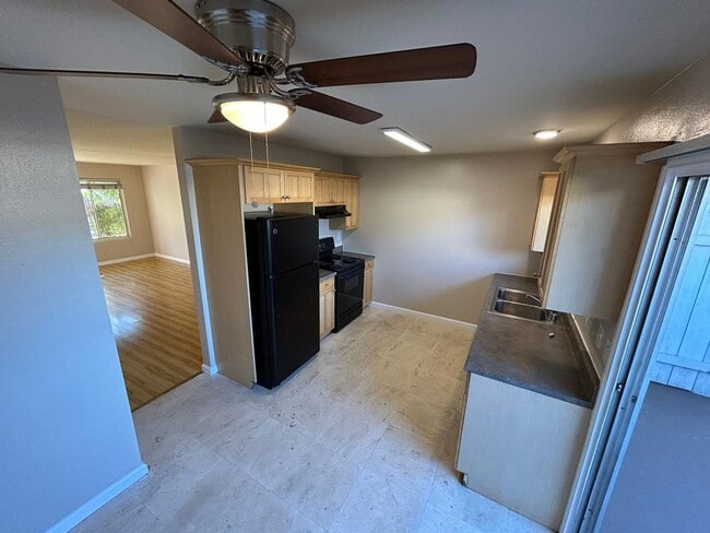 Photo - 2 Bedroom 1.5 Bath Townhome. Gated Community. Upgraded & 2 Parking Spaces