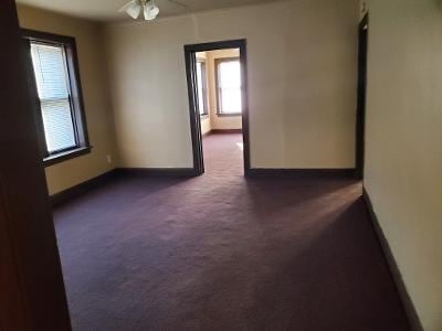 Building Photo - 20-1020 W 70th St Unit 1W