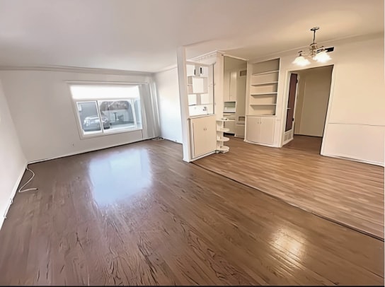 Building Photo - 6125 Cashio St Unit 1