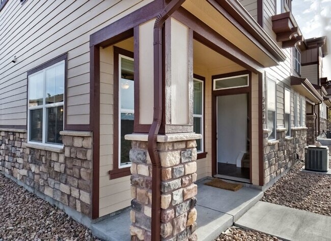 Photo - Immaculate 3-Bedroom Townhome with Stainless Steel Appliances and Attached Garage Near Peterson SFB