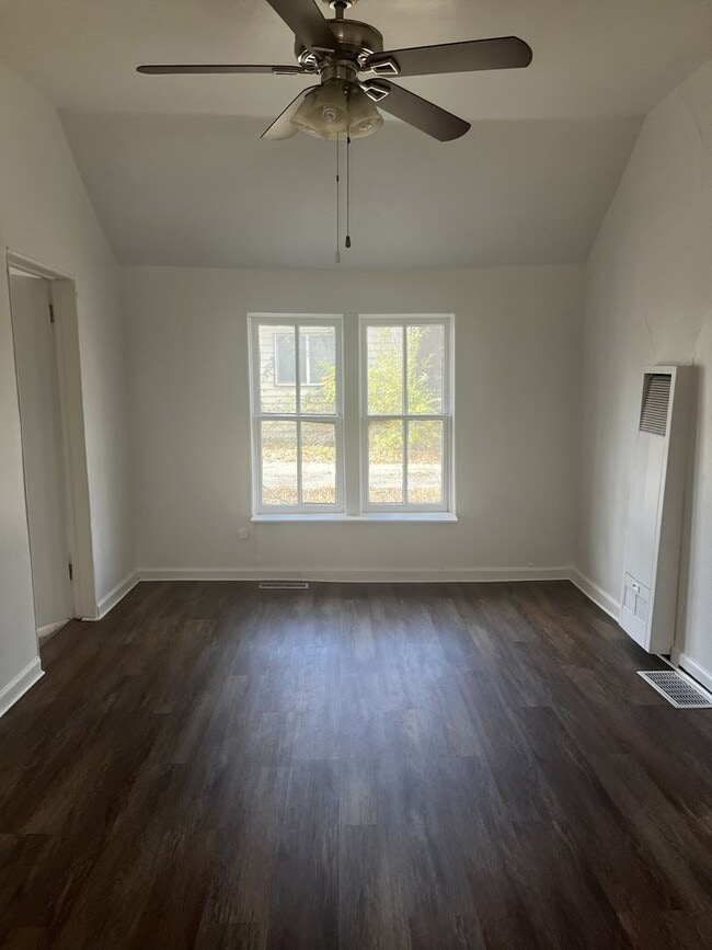 Photo - Charming 2-Bedroom Home with Expansive Bac...