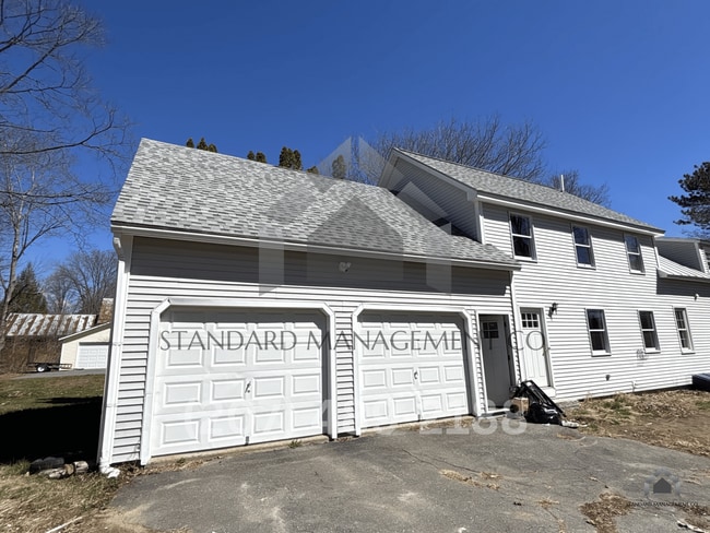 Photo - Spacious Updated 4BR/3BA Home | Garage, W/D, Pet-Friendly – $2,700