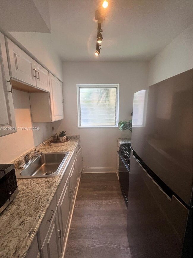 Photo - 7720 Harding Ave Unit 9