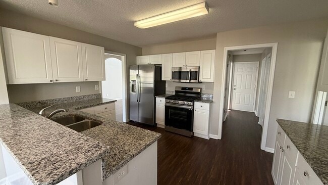 Photo - 4BR Home with High Ceilings & Main-Level Suite In Hillgrove District