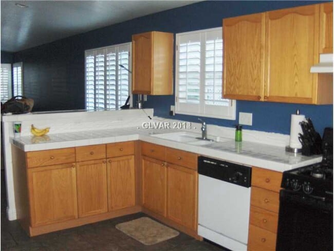 Photo - 1 story home with 2 car garage in a gated community