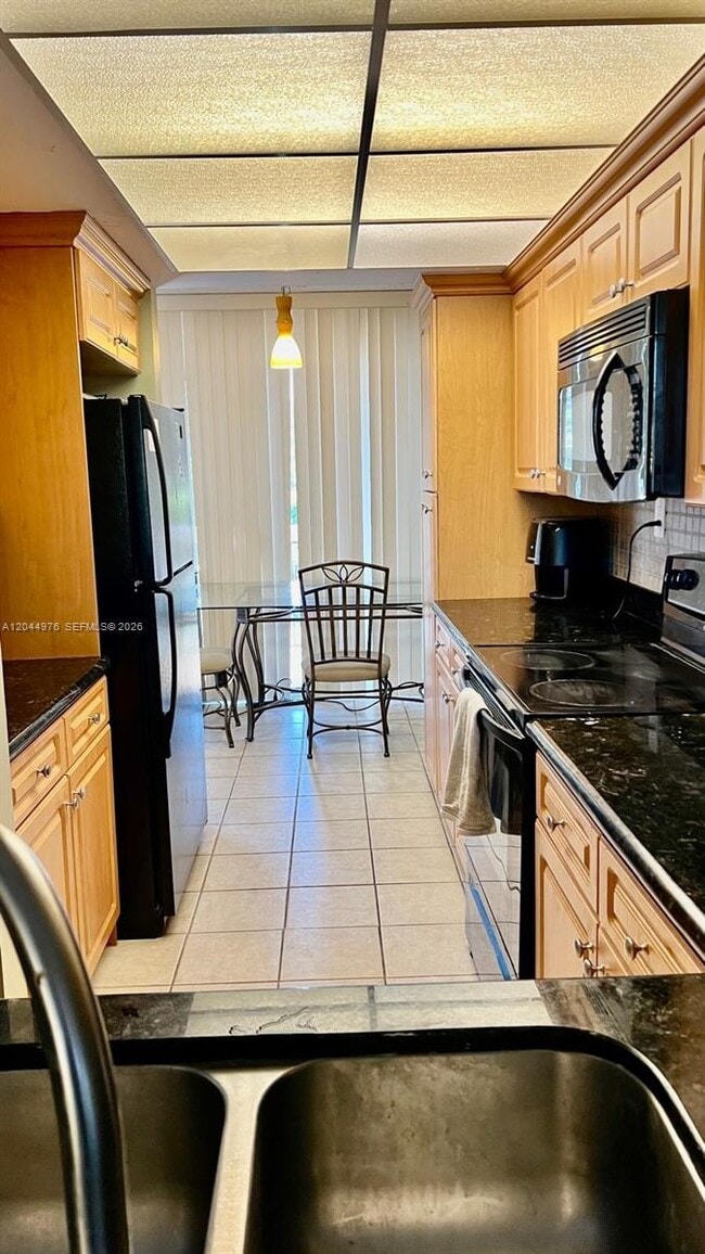 Building Photo - 8711 SW 30th St Unit 106