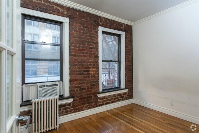 Building Photo - 410 E 13th St Unit 2A Rental