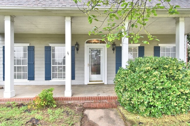 Photo - Look at that amazing Front Porch!! Room to gather inside and out.