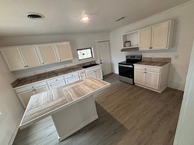 Photo - 4 BEDROOM 2 BATH HOUSE FRESHLY UPDATED MINI SPLITS FOR HEAT AND AIR. STORAGE BUILDING IN BACK NOT...