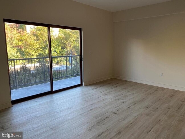 Building Photo - 3750 Main St Unit 303