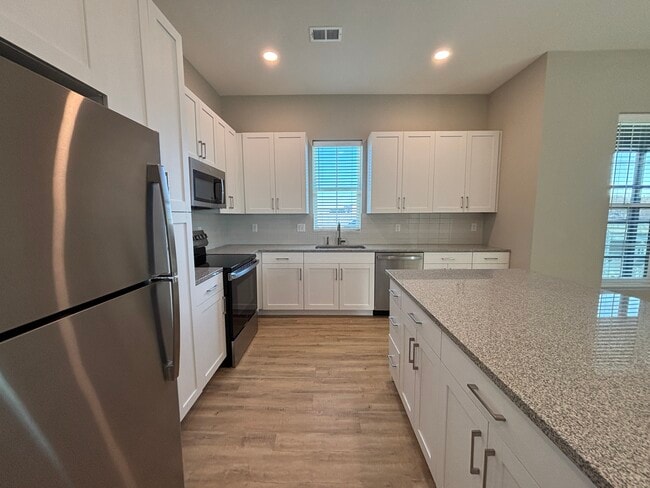 Building Photo - Mission Flats Apartments